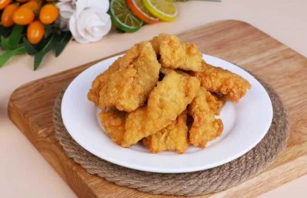Breaded crispy pollock portion · Produktabbildung zur Orientierung